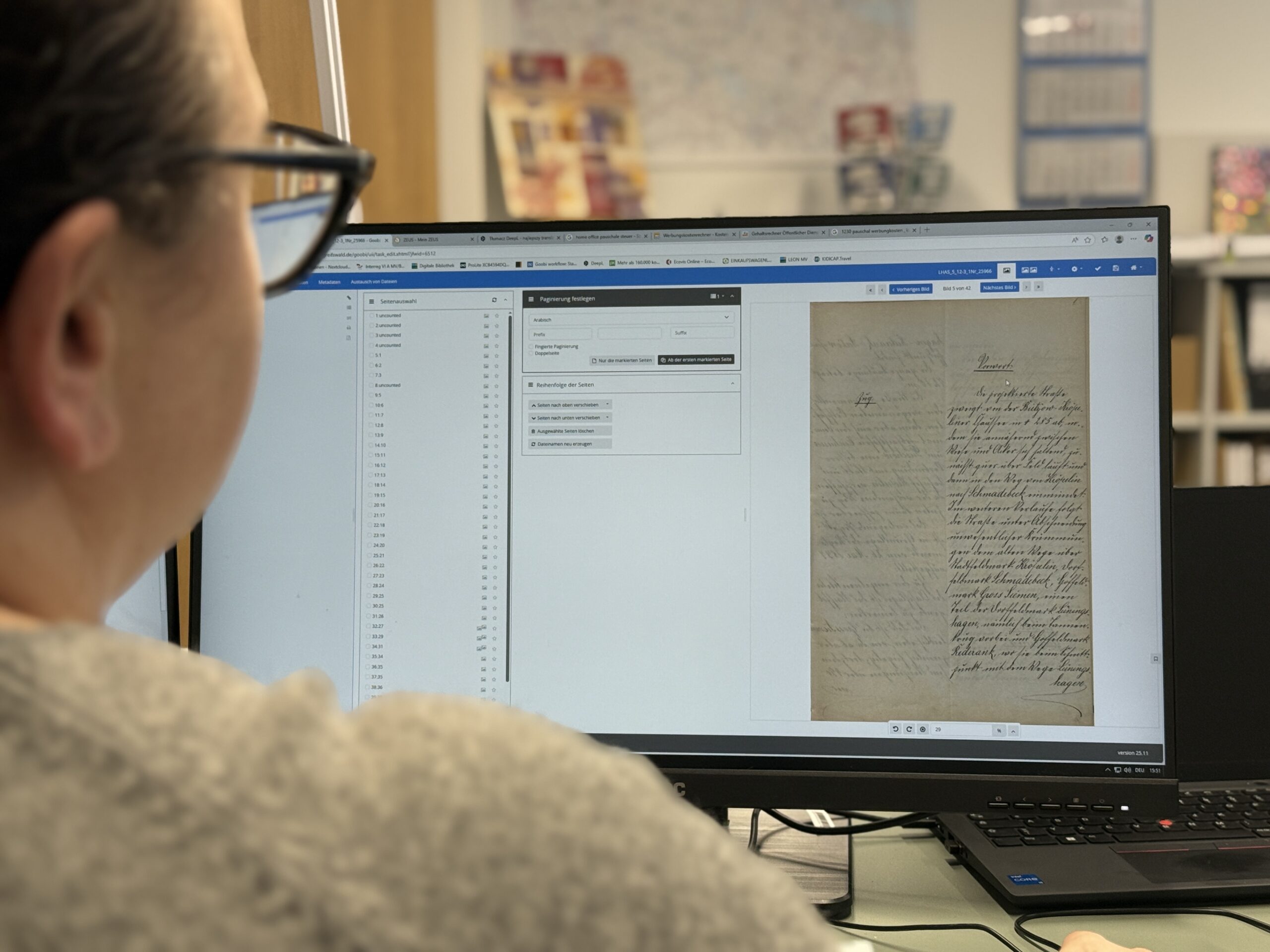 A woman in front of a screen